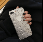 Funda para iPhone 7 con diseño de corazón plateado y copos metálicos transparentes